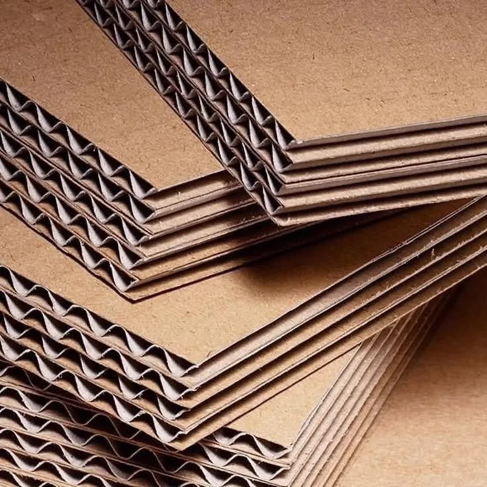 Stacked corrugated board sheets showing the flute profile
